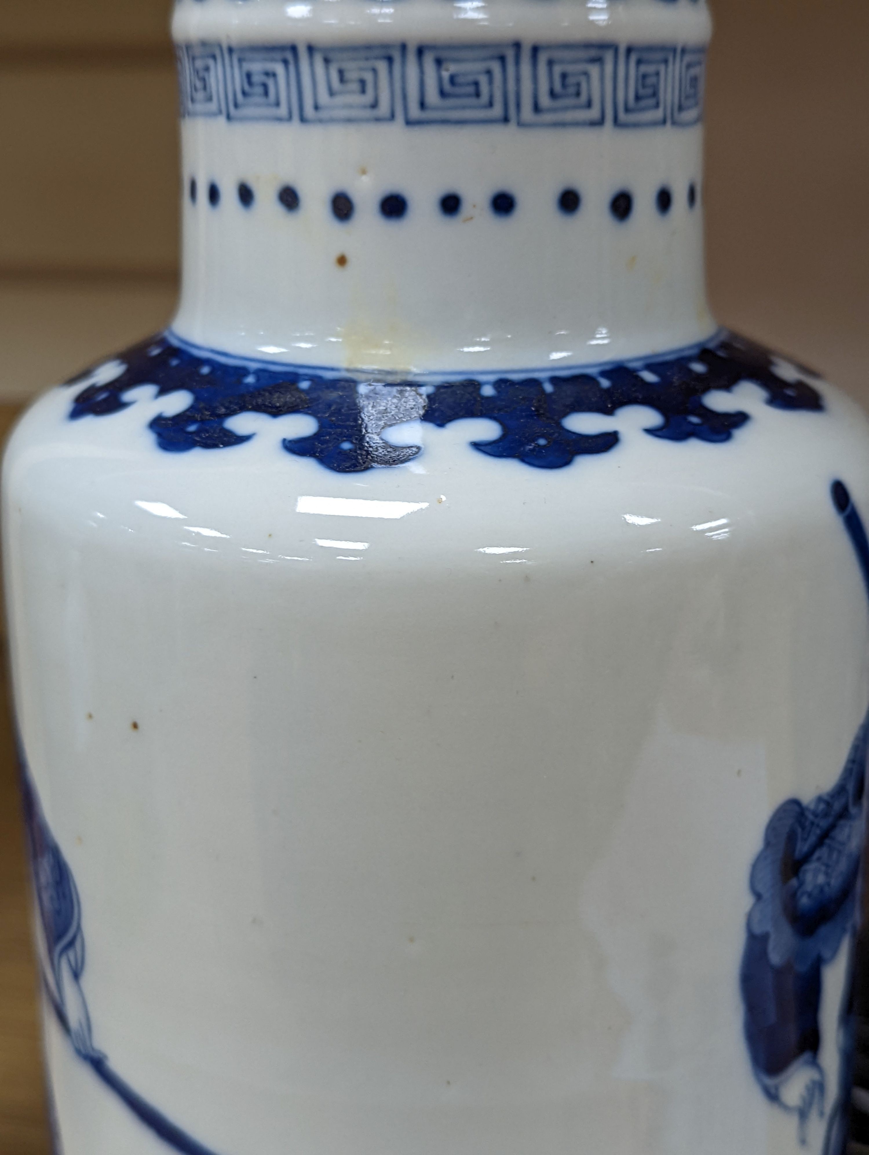 A Chinese blue and white rouleau vase, 35 cms.